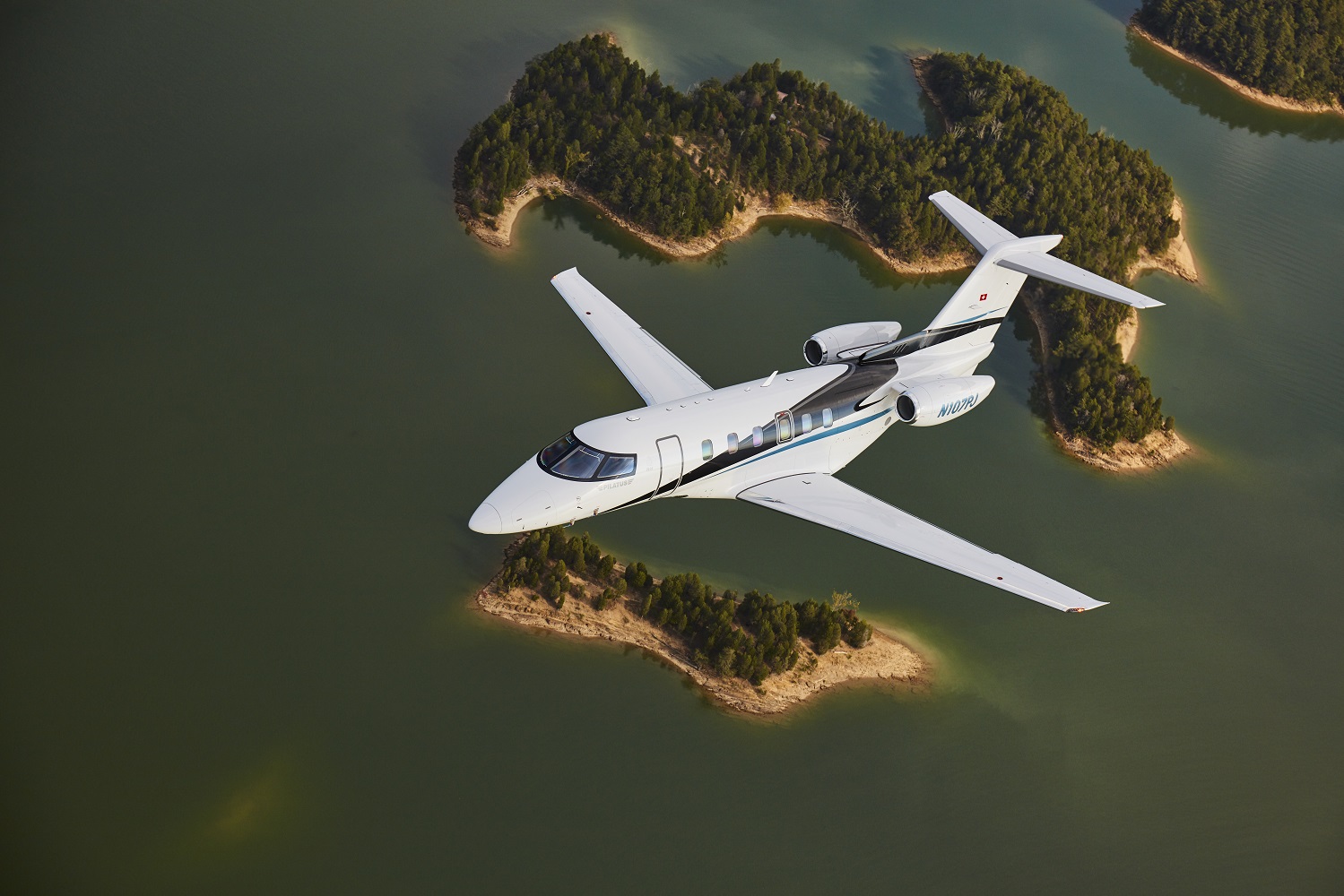 Aerial photography of the Pilatus PC-24, owned by Skytech, flying over Douglas Lake west of Asheville.
Asheville Regional Airport (AVL)
Asheville NC USA