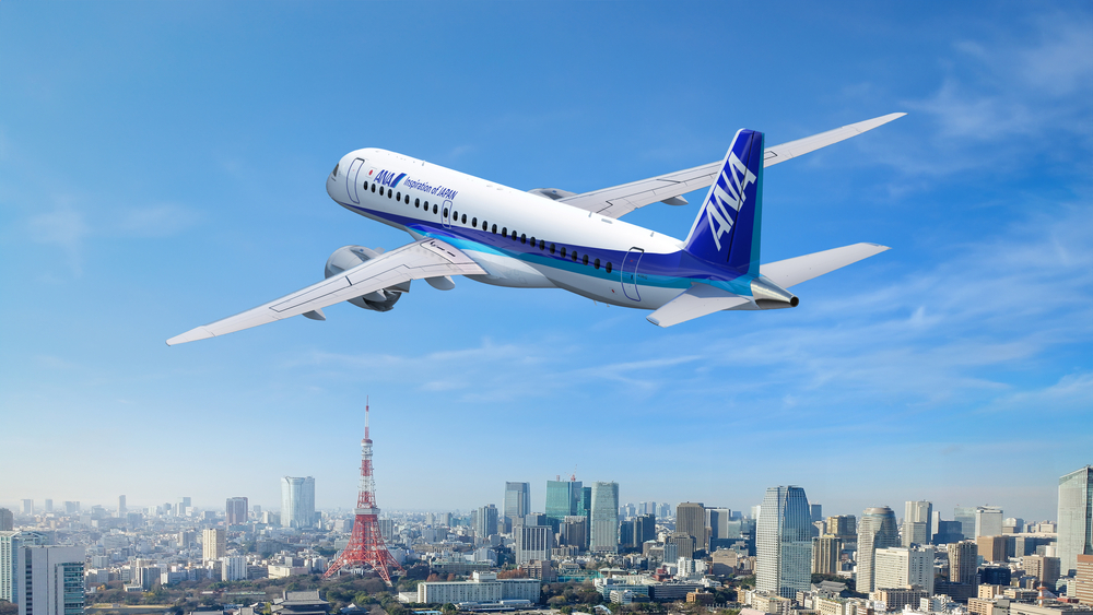 Embraer 190E2 da ANA sobre Tóquio. Concepção artística da Embraer